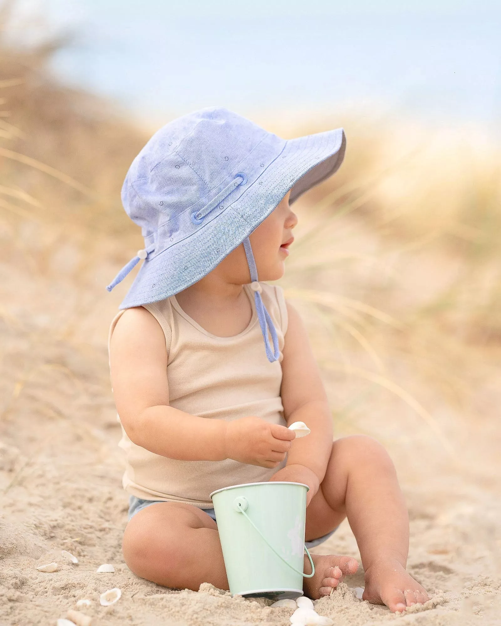 Toshi Sunhat Xavier Sky