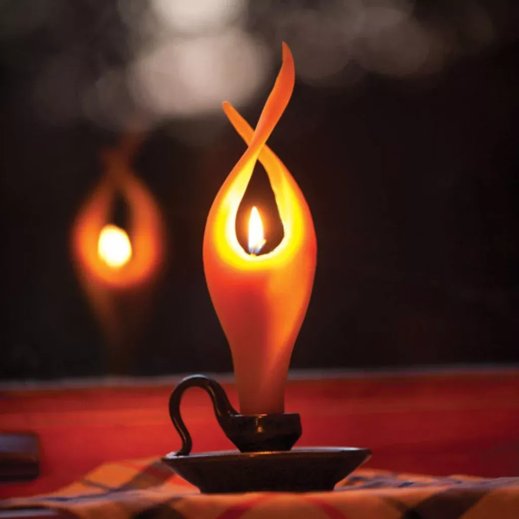 Winged beeswax candle